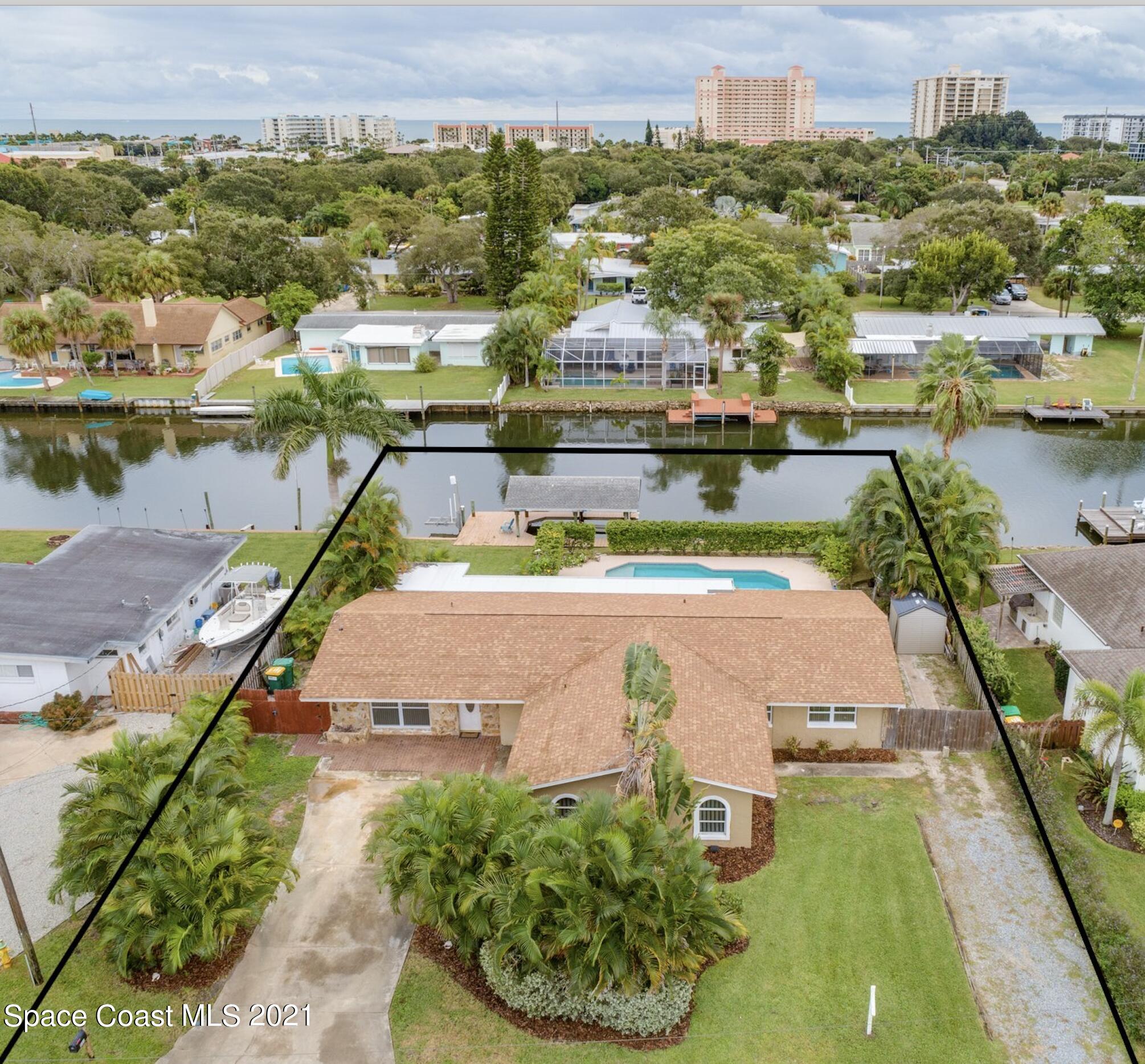 931 Bali Road Cocoa Beach, FL 32931 - Photo 2 of 42 a view of swimming pool from a balcony