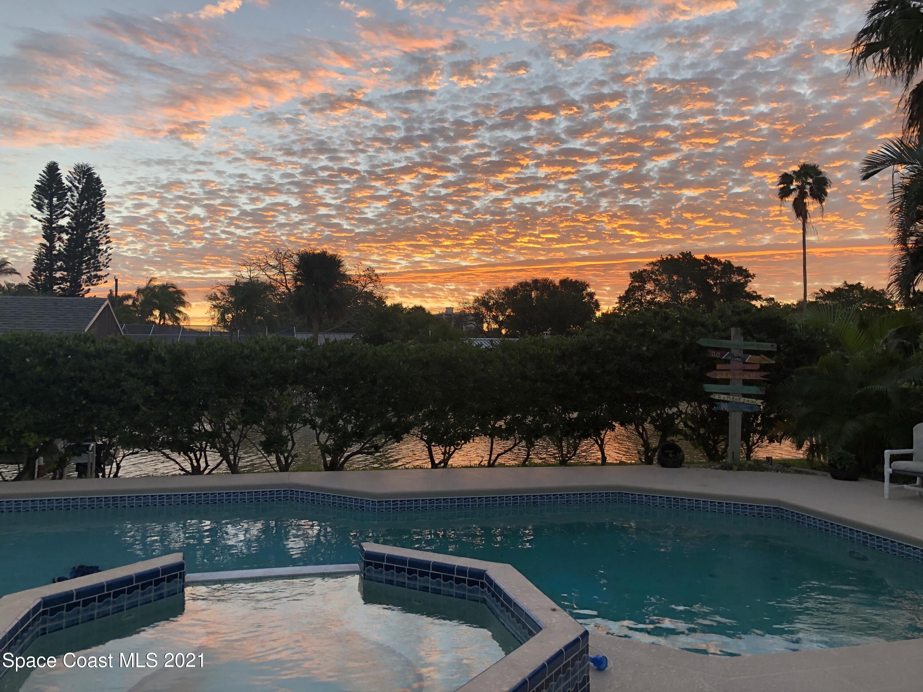 931 Bali Road Cocoa Beach, FL 32931 - Photo 31 of 42 Pool / Sky
