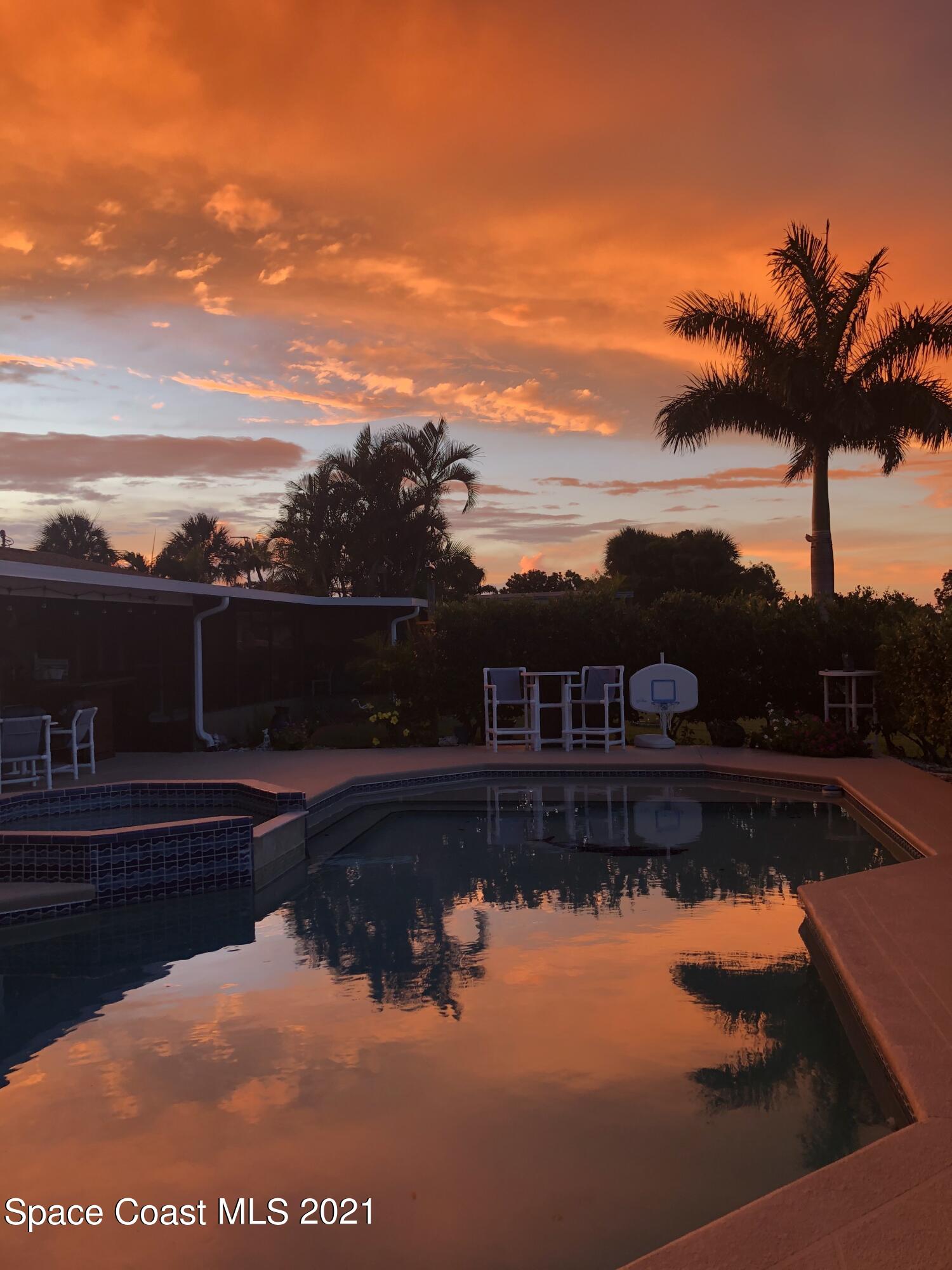 931 Bali Road Cocoa Beach, FL 32931 - Photo 37 of 42 931 Sunset sky :pool