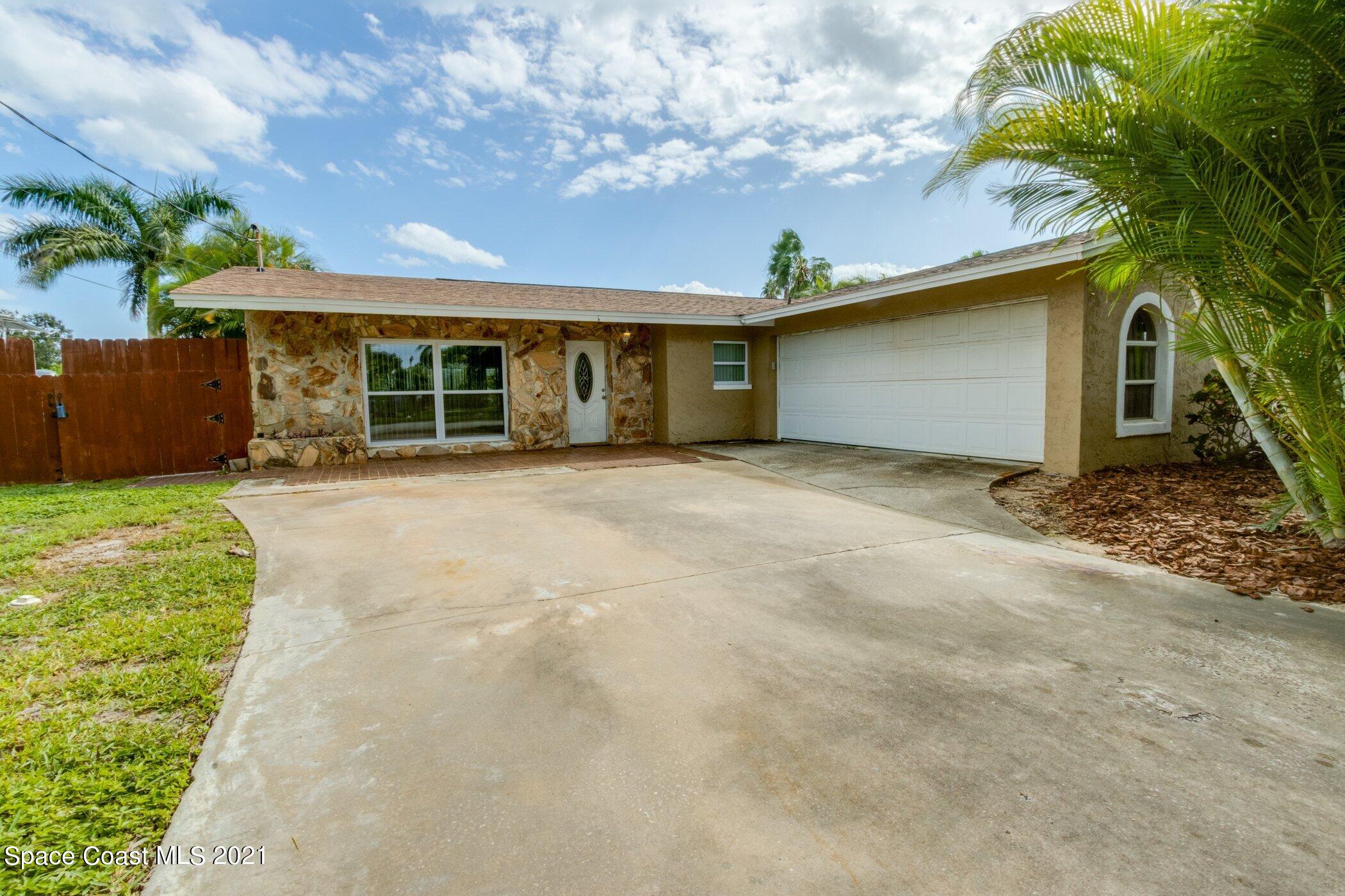 931 Bali Road Cocoa Beach, FL 32931 - Photo 5 of 42 931-Bali-Front