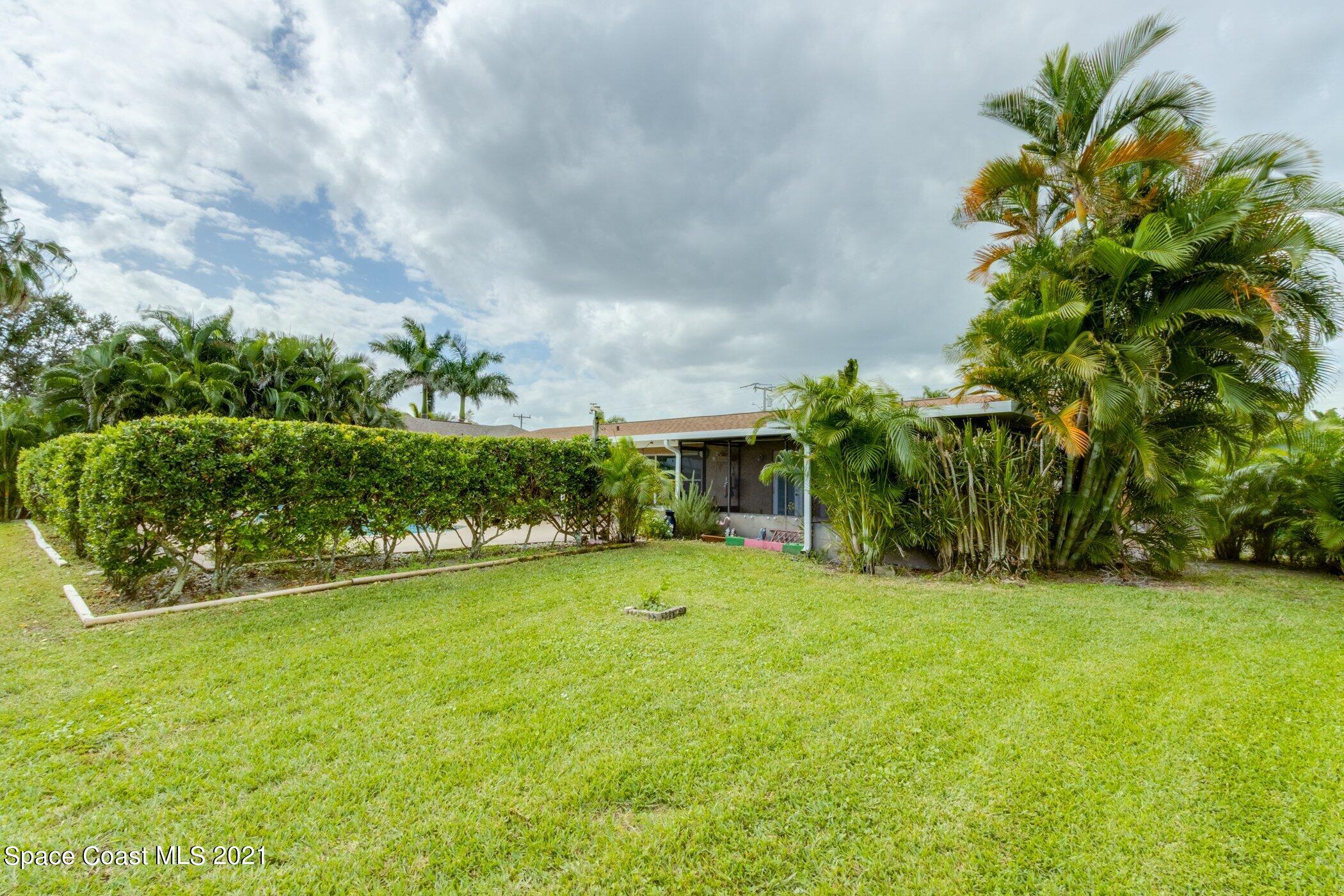 931 Bali Road Cocoa Beach, FL 32931 - Photo 9 of 42 Back Yard