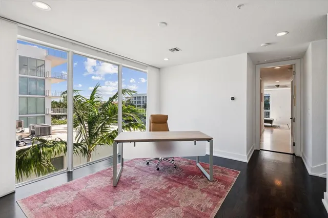 a view of a livingroom with furniture
