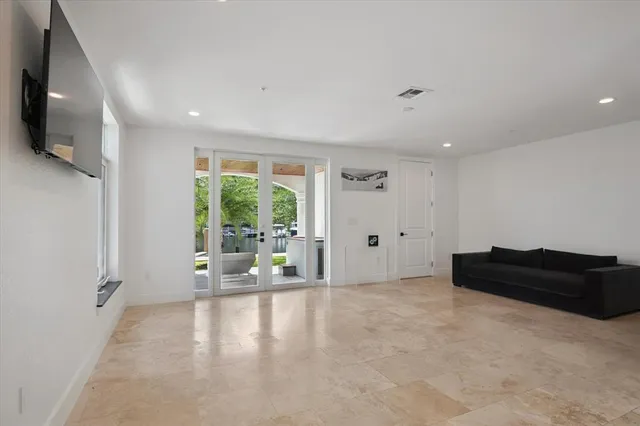 a living room with furniture and a couch