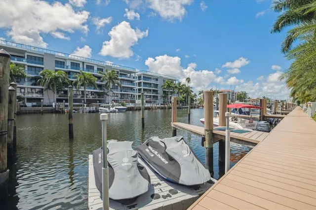 an aerial view of a houses with yard