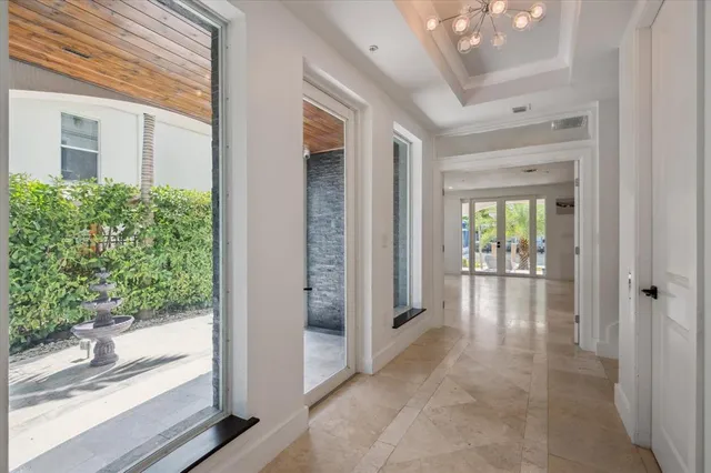 a view of a hallway and interior of the house