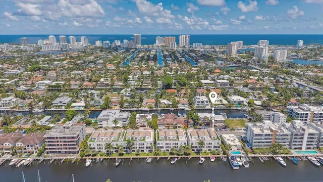 an aerial view of residential houses with outdoor space