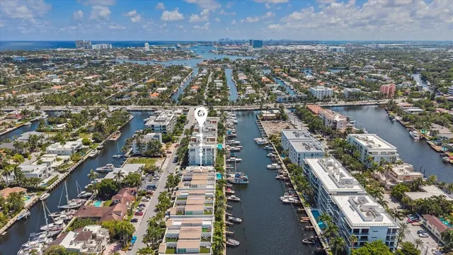 aerial view of a house with swimming pool and sitting area