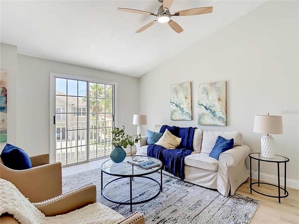 5310 Anhinga Trail New Port Richey, FL 34653 - Photo 4 of 27 a living room with furniture and a large window