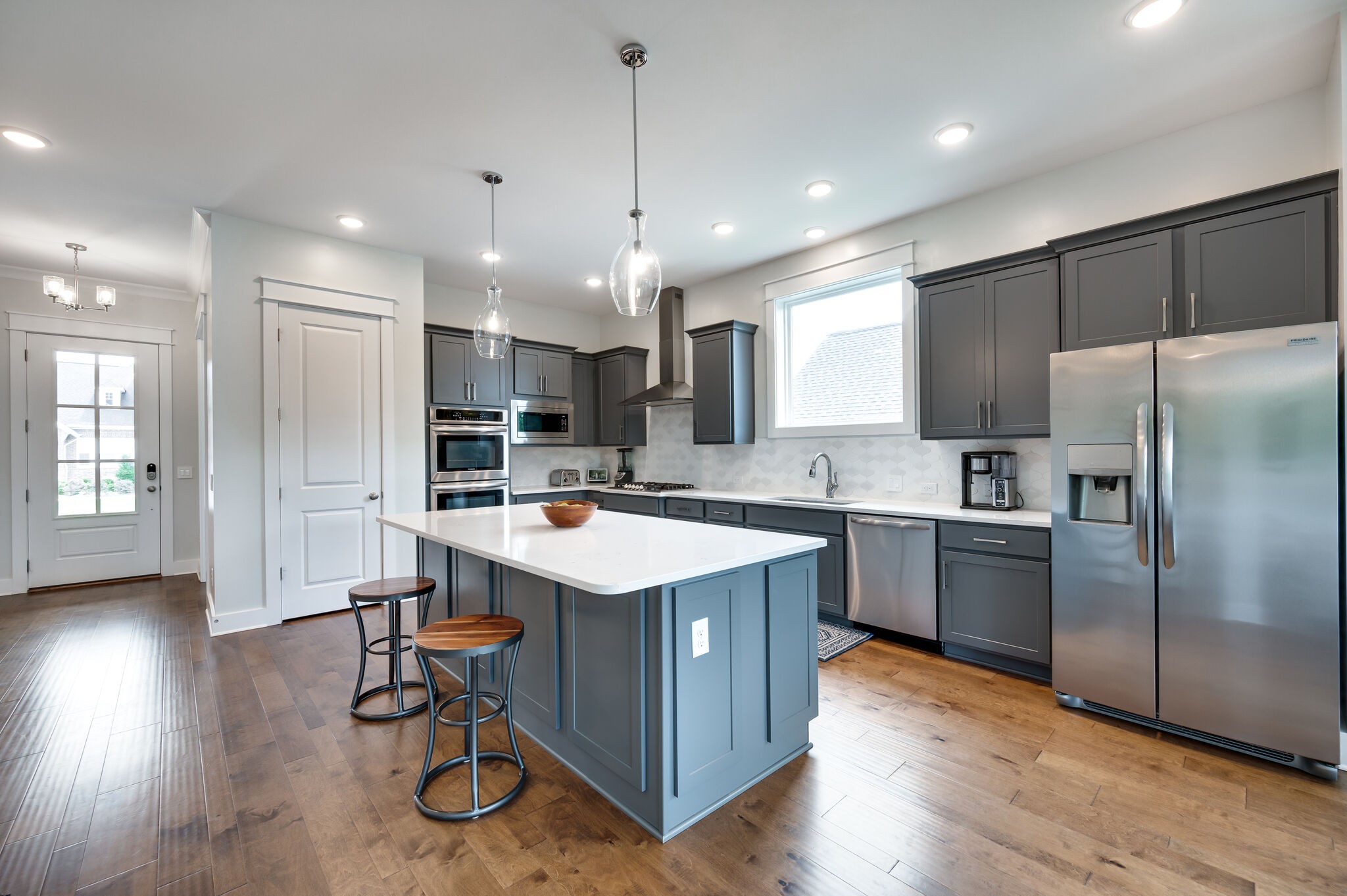 7751 Thayer Road Nolensville, TN 37135 - Photo 16 of 69 a kitchen with a refrigerator a sink and a microwave