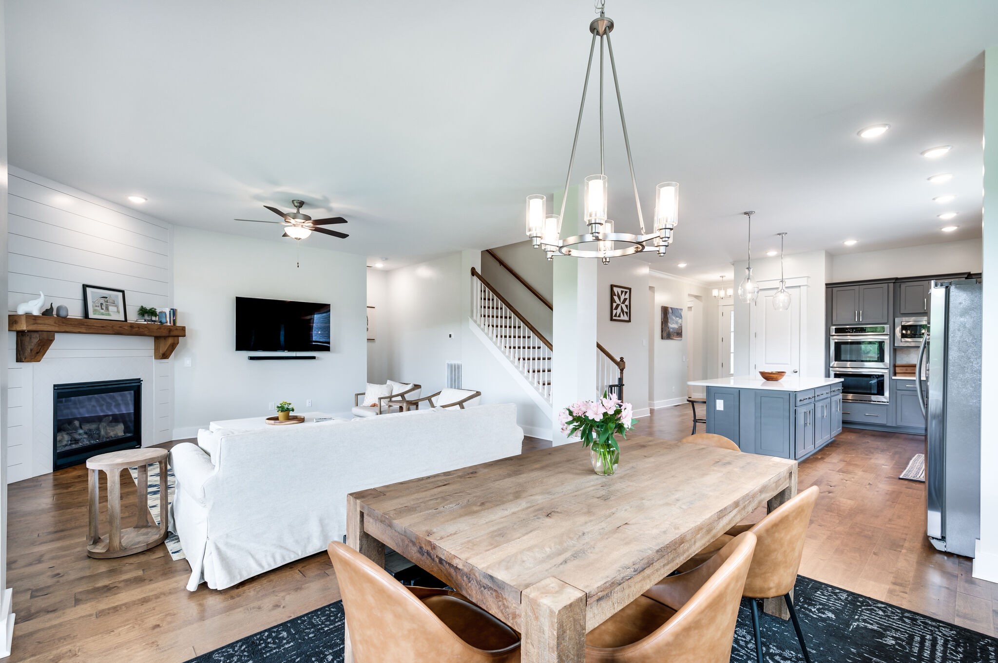 7751 Thayer Road Nolensville, TN 37135 - Photo 19 of 69 a view of a dining room with furniture wooden floor and chandelier