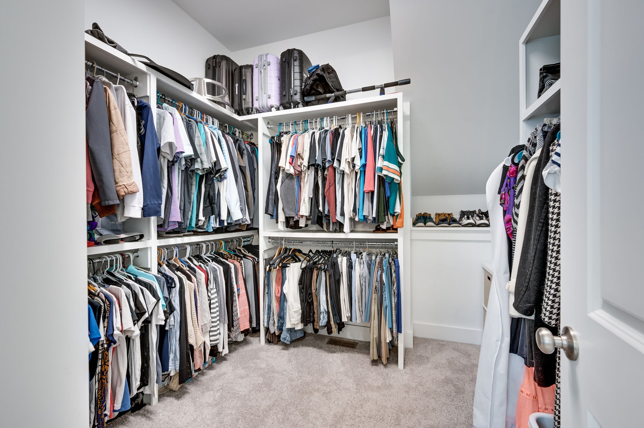 7751 Thayer Road Nolensville, TN 37135 - Photo 31 of 69 a view of walk in closet with clothes and shoes