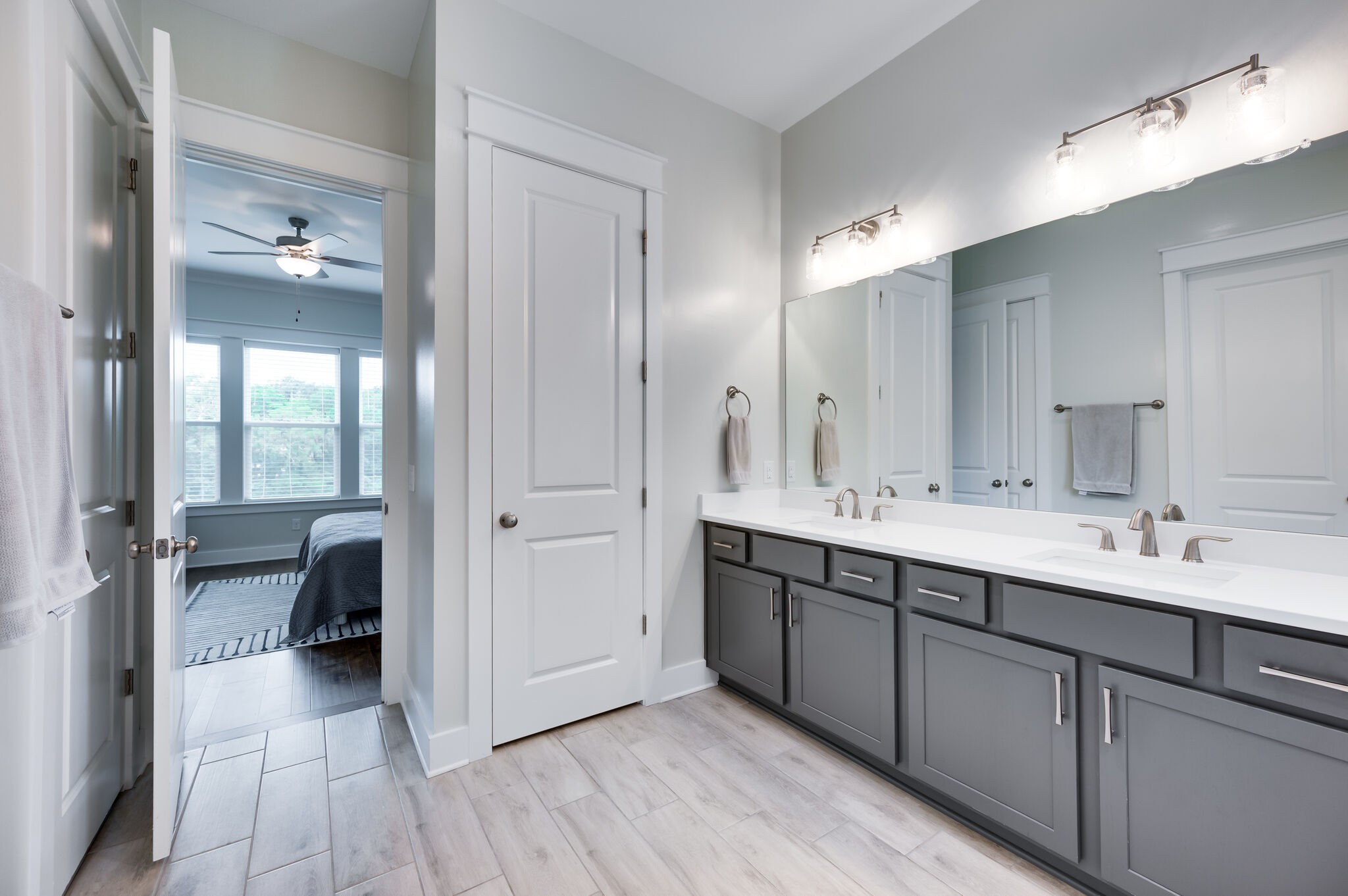 7751 Thayer Road Nolensville, TN 37135 - Photo 33 of 69 a spacious bathroom with a double vanity sink and a mirror