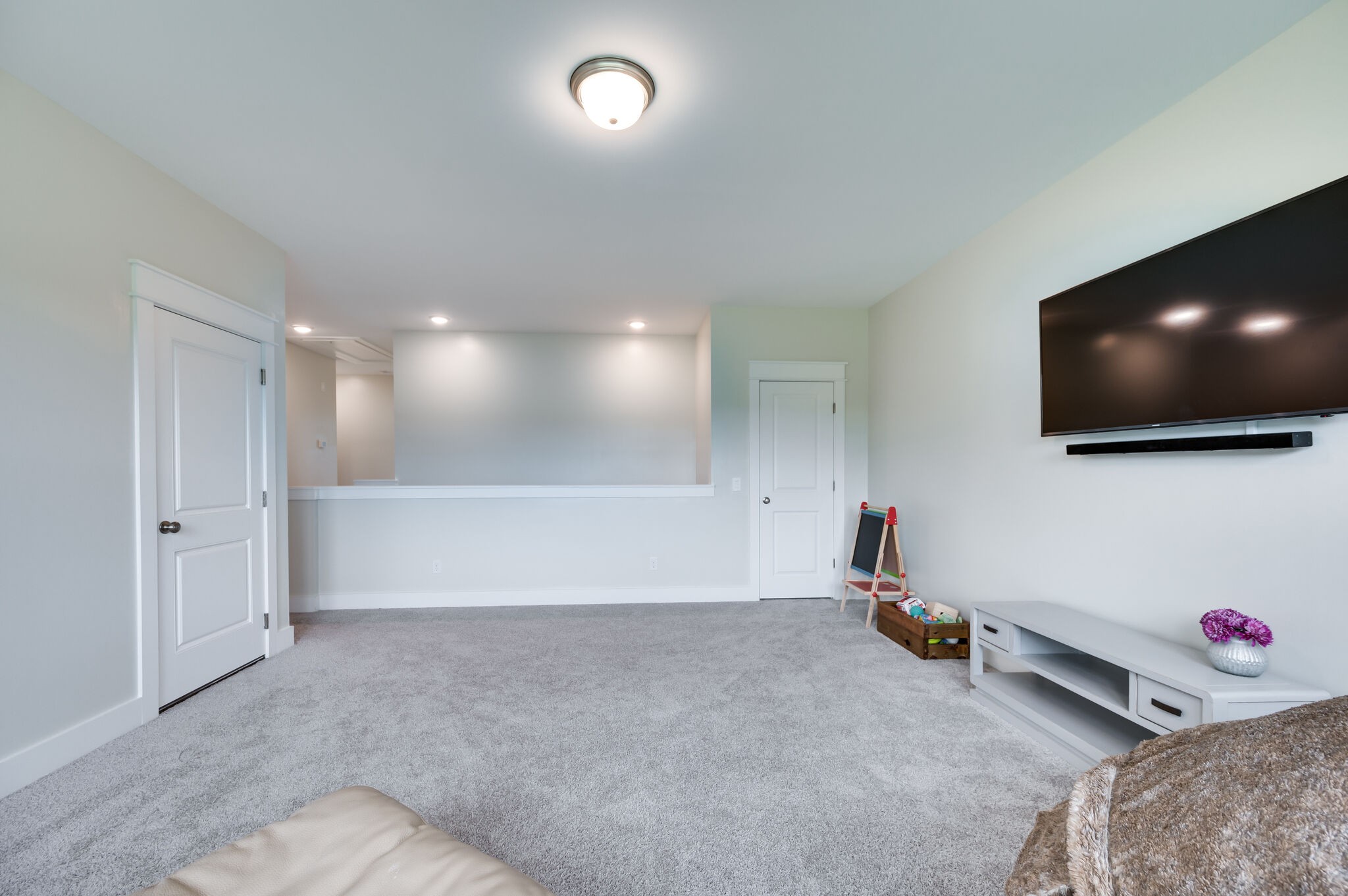 7751 Thayer Road Nolensville, TN 37135 - Photo 37 of 69 a view of room with wooden floor and flat screen tv