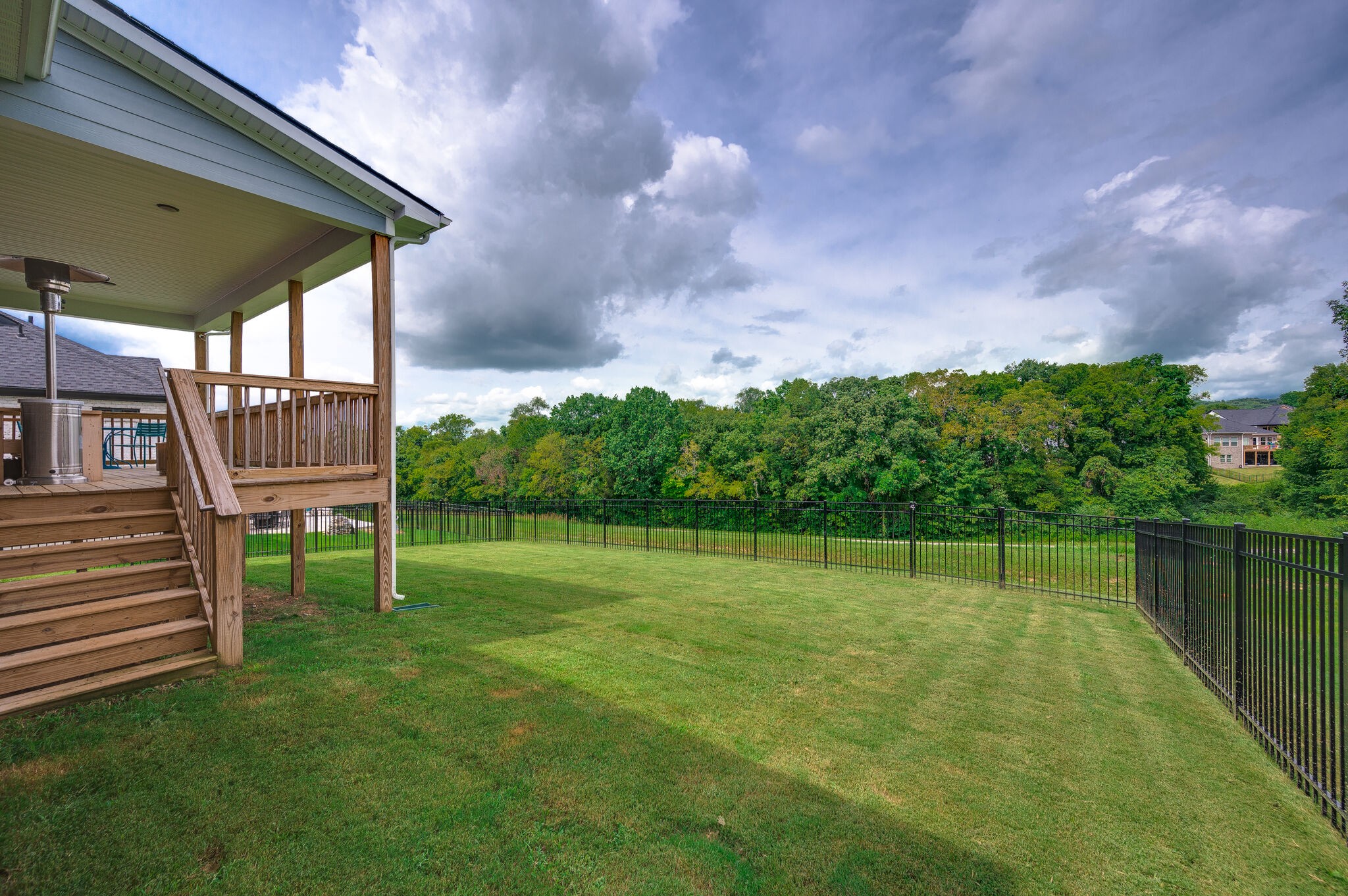 7751 Thayer Road Nolensville, TN 37135 - Photo 45 of 69 a view of a chair and table in the backyard