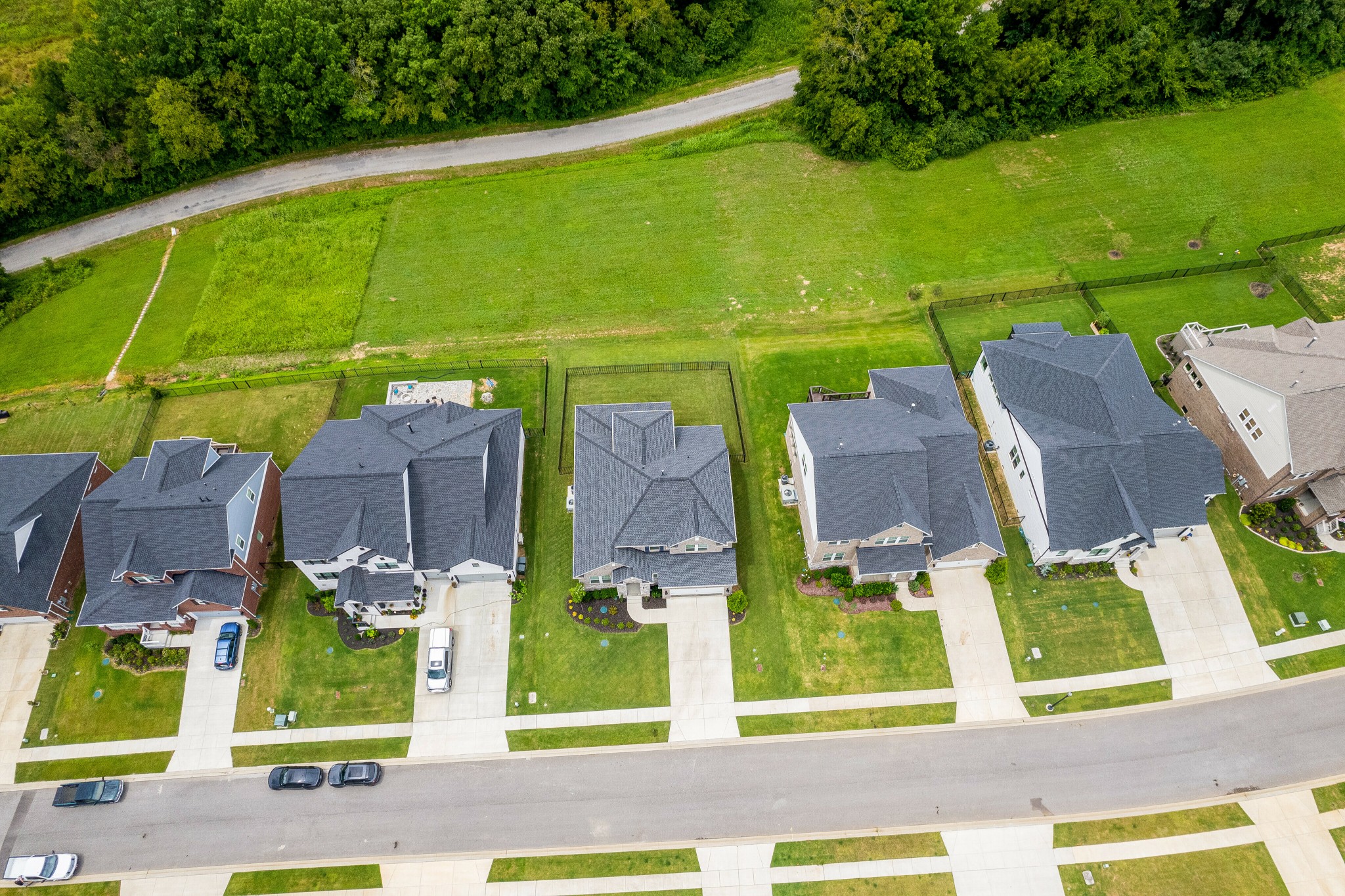 7751 Thayer Road Nolensville, TN 37135 - Photo 62 of 69 an aerial view of residential houses with outdoor space and swimming pool