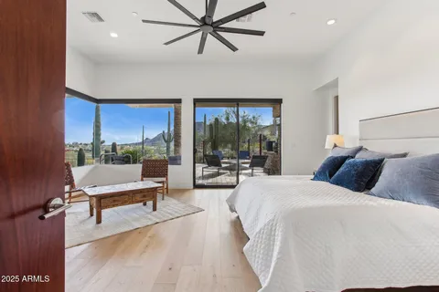 a bathroom with a shower and a sink