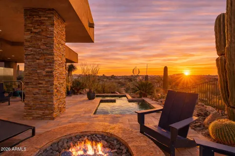 a view of a street with a building in the background