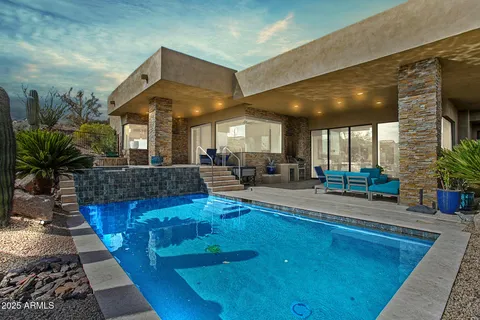 a view of a street with a building in the background