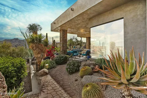 a view of living room with furniture and window