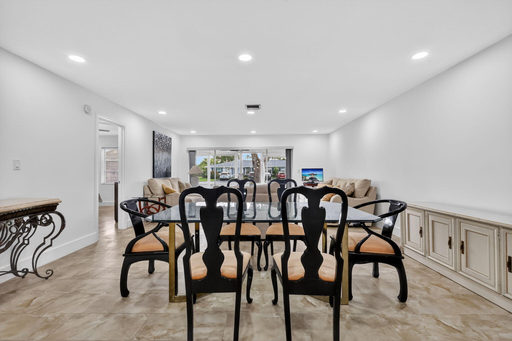 5093 Privet Place, Unit A1 Delray Beach, FL 33484 - Photo 12 of 54 a view of a dining area with furniture
