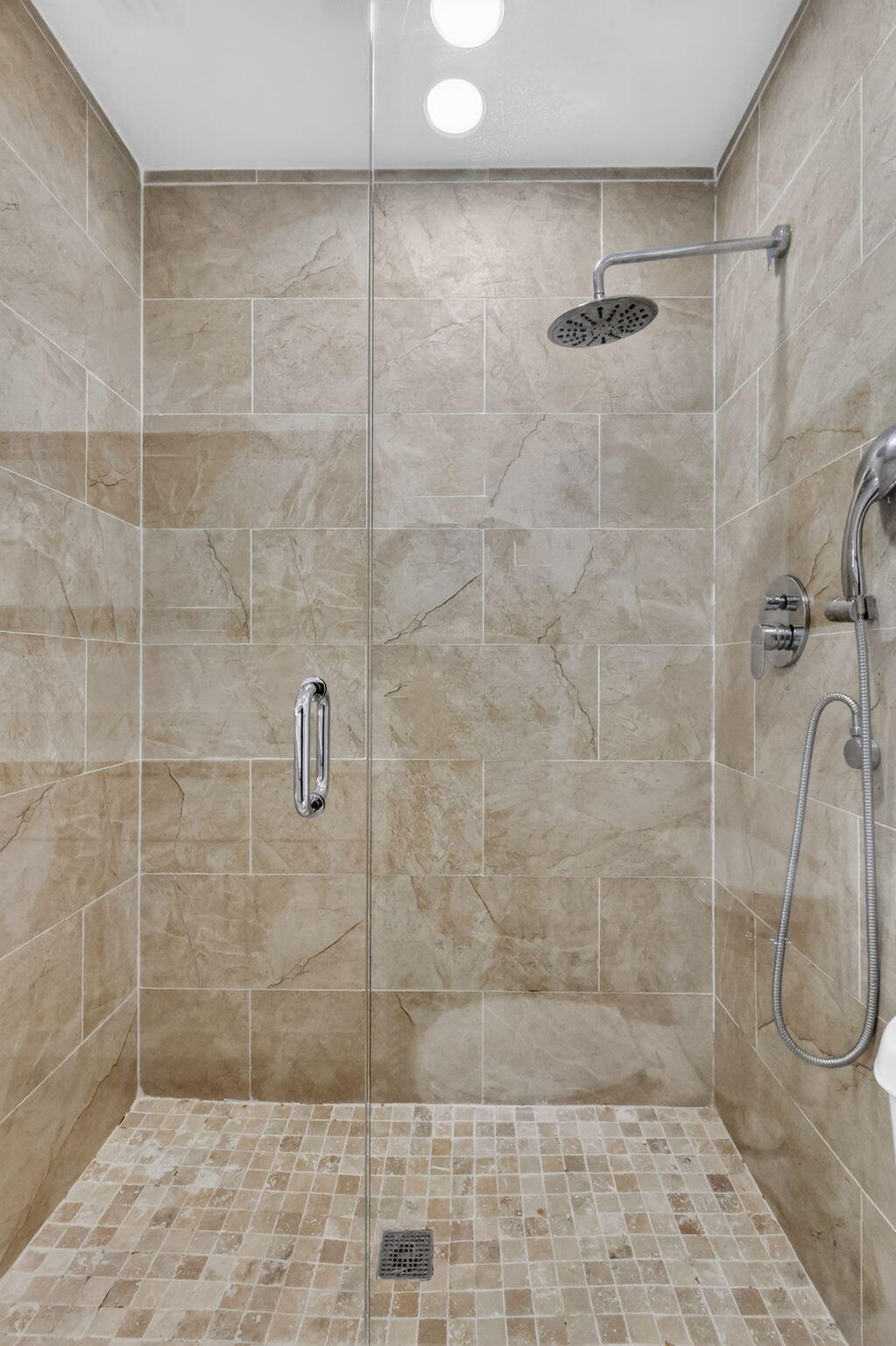 5093 Privet Place, Unit A1 Delray Beach, FL 33484 - Photo 29 of 54 a bathroom with a shower