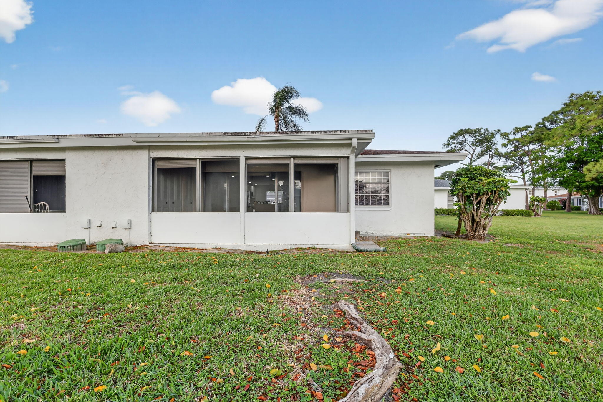5093 Privet Place, Unit A1 Delray Beach, FL 33484 - Photo 39 of 54 a house view with a garden space