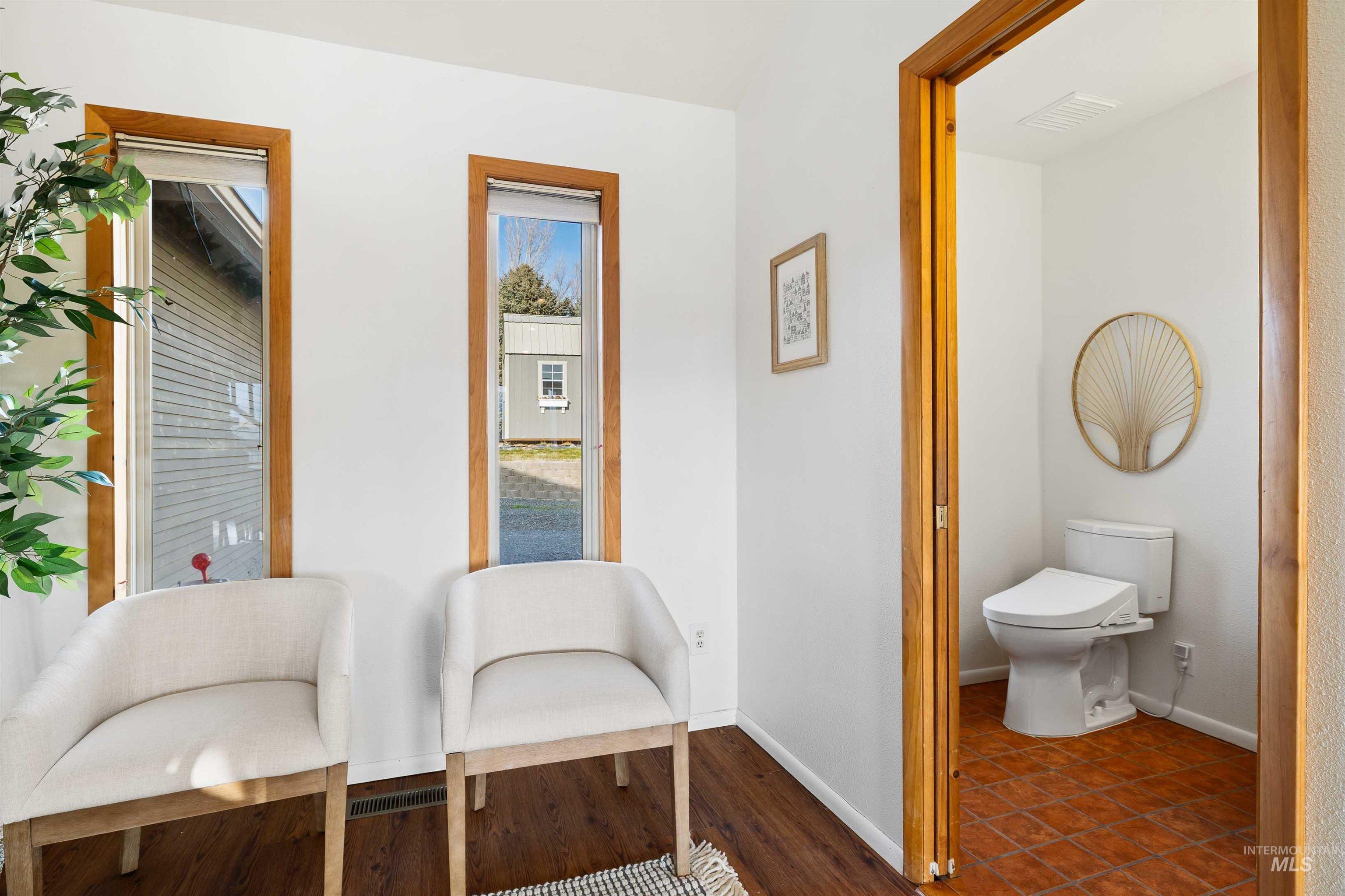 853 Pottery Road Bliss, ID 83314 - Photo 22 of 50 Sitting room featuring baseboards and dark wood finished floors