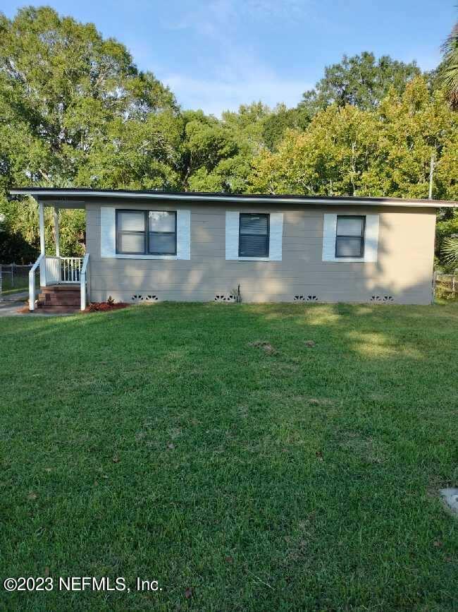 5721 Bree Road Jacksonville, FL 32209 - Photo 2 of 15 a view of a house with a backyard