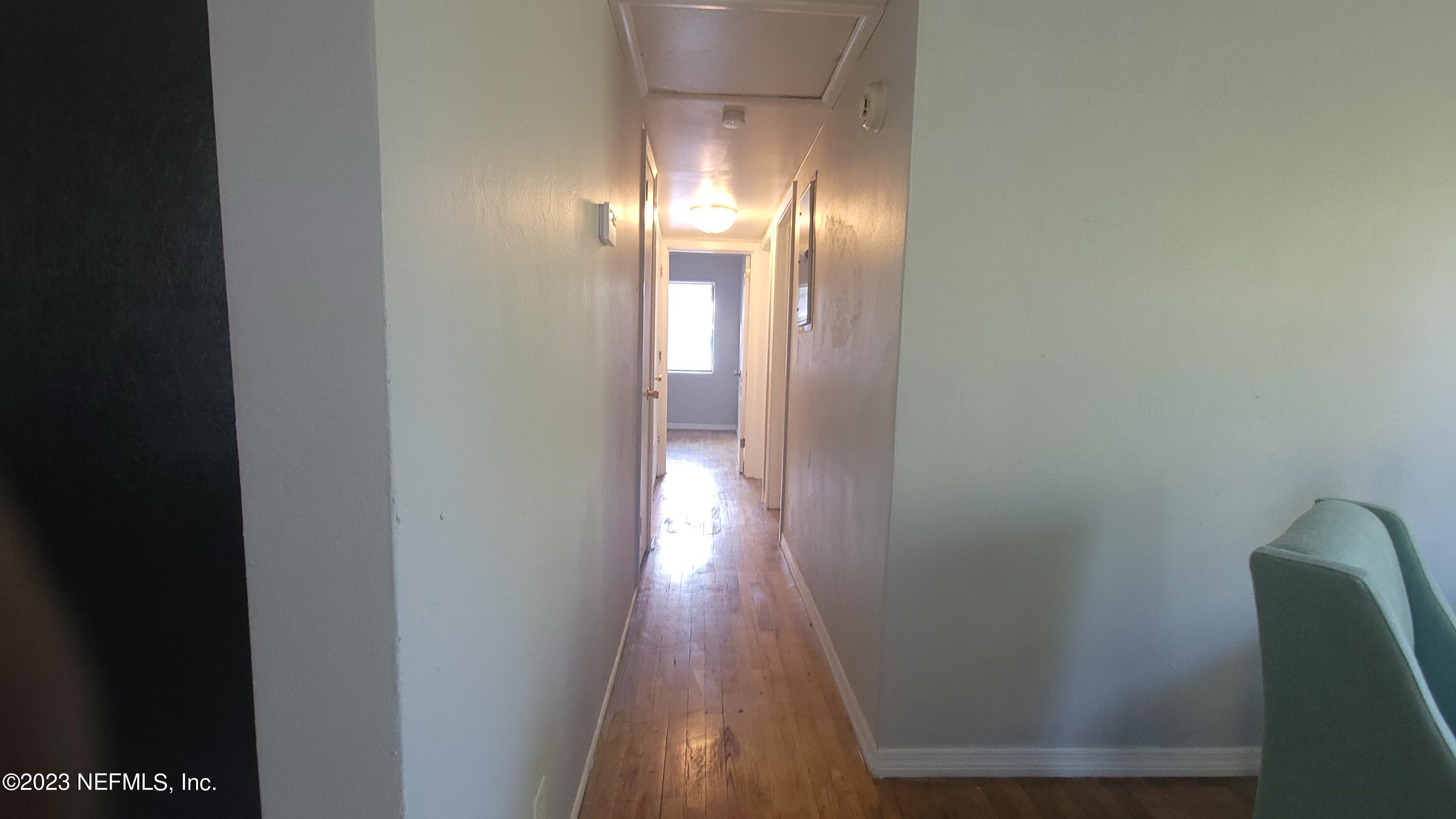 5721 Bree Road Jacksonville, FL 32209 - Photo 10 of 15 a view of gallery with wooden floor