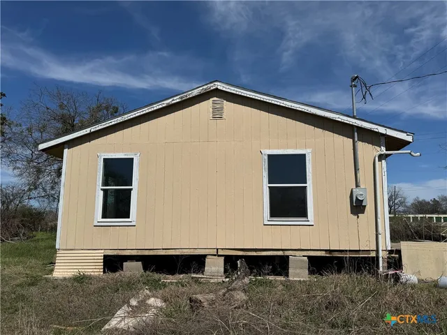 a front view of a house with windows