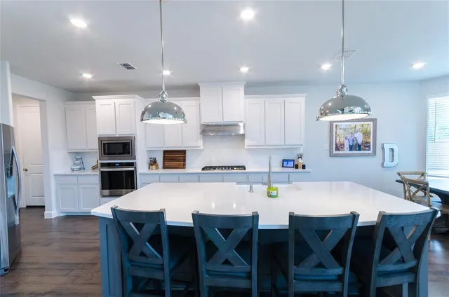 a large kitchen with lots of counter space