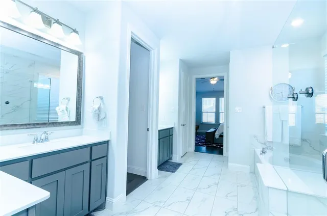 a spacious bathroom with a shower