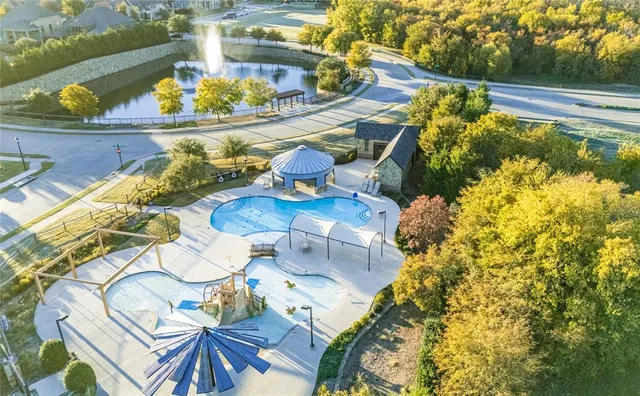 a view of a storage and utility room with washer and dryer