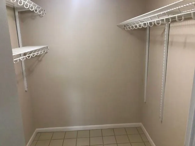 a view of a room with racks on the wall