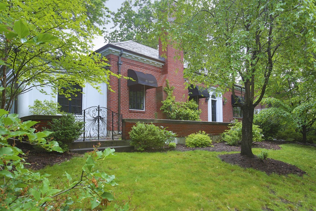 11 Worthington Road Brookline, MA 02446 - Photo 16 of 21 a front view of a house with garden