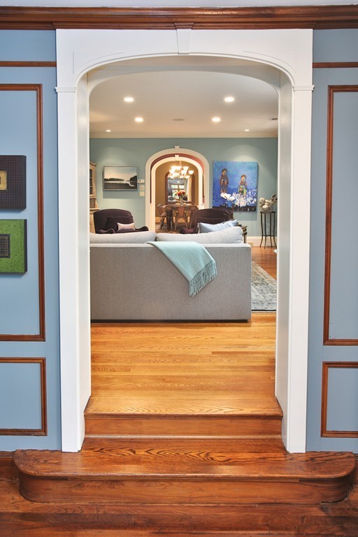 11 Worthington Road Brookline, MA 02446 - Photo 4 of 21 a view of living room with wooden floor and cabinet