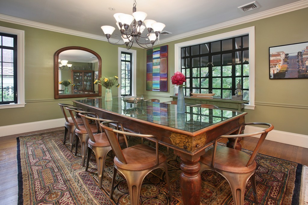 11 Worthington Road Brookline, MA 02446 - Photo 6 of 21 a dining room with furniture a chandelier and wooden floor