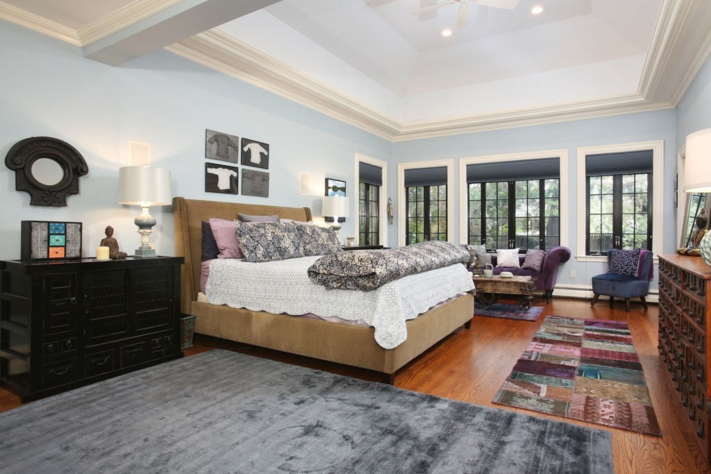 11 Worthington Road Brookline, MA 02446 - Photo 8 of 21 a spacious bedroom with a bed couch and a large window
