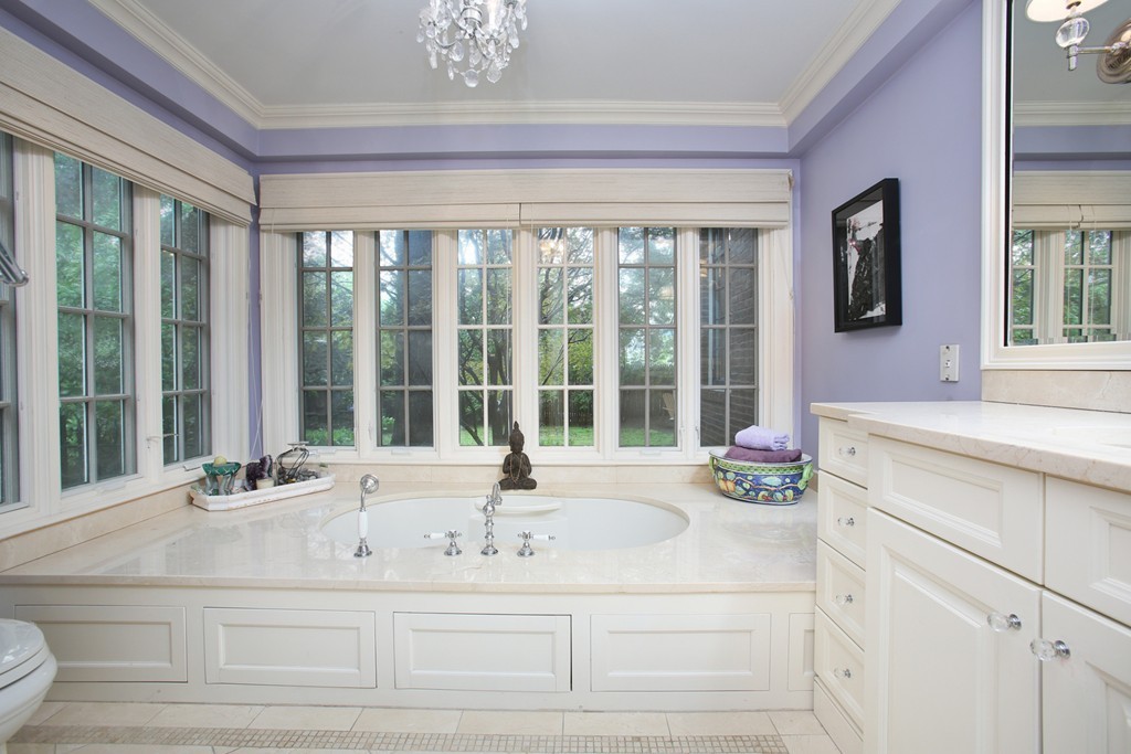 11 Worthington Road Brookline, MA 02446 - Photo 9 of 21 a bathroom with a granite countertop sink and a large window