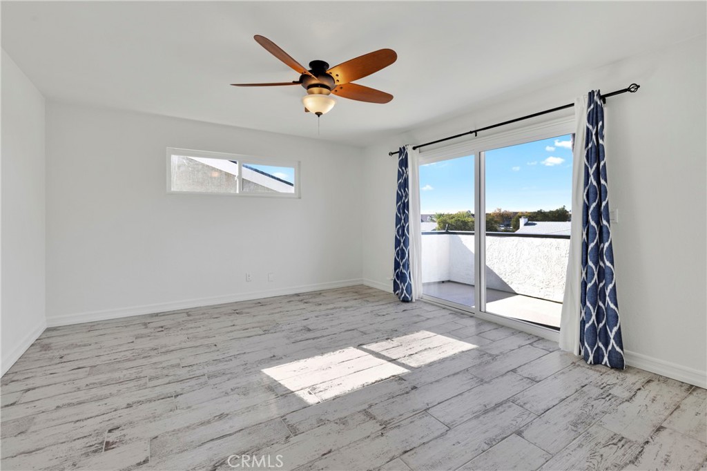 34092 Alcazar Drive, Unit A Dana Point, CA 92629 - Photo 11 of 18 a view of empty room with wooden floor and fan