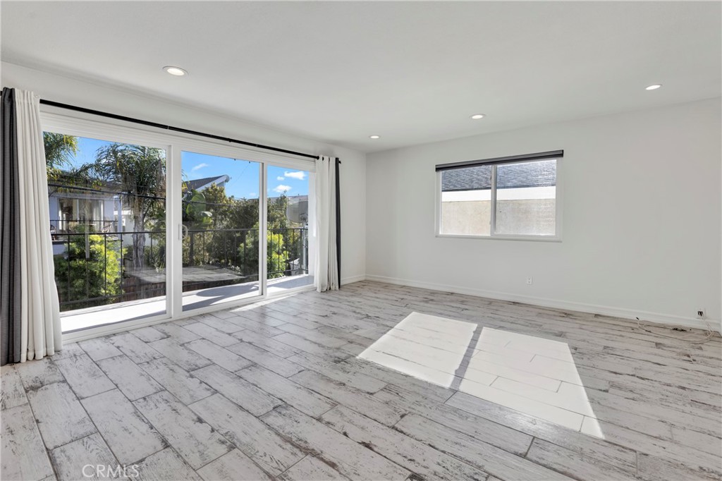 34092 Alcazar Drive, Unit A Dana Point, CA 92629 - Photo 5 of 18 a view of an empty room with glass door