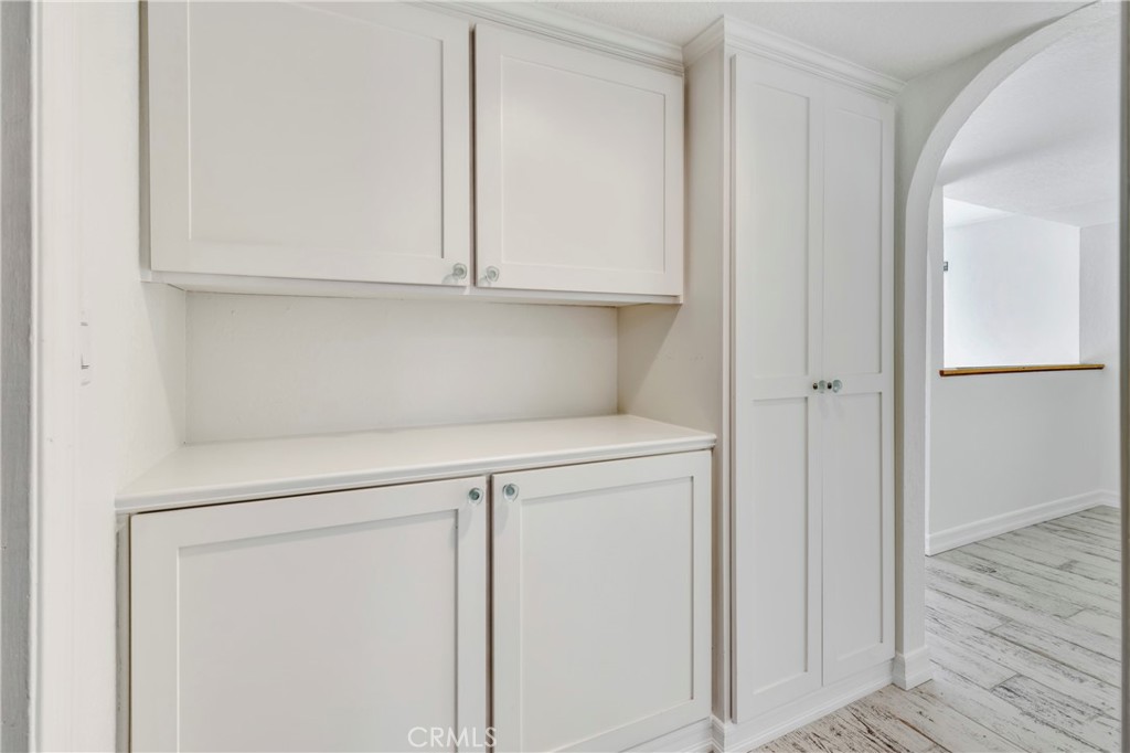 34092 Alcazar Drive, Unit A Dana Point, CA 92629 - Photo 7 of 18 a view of cabinets and wooden floor