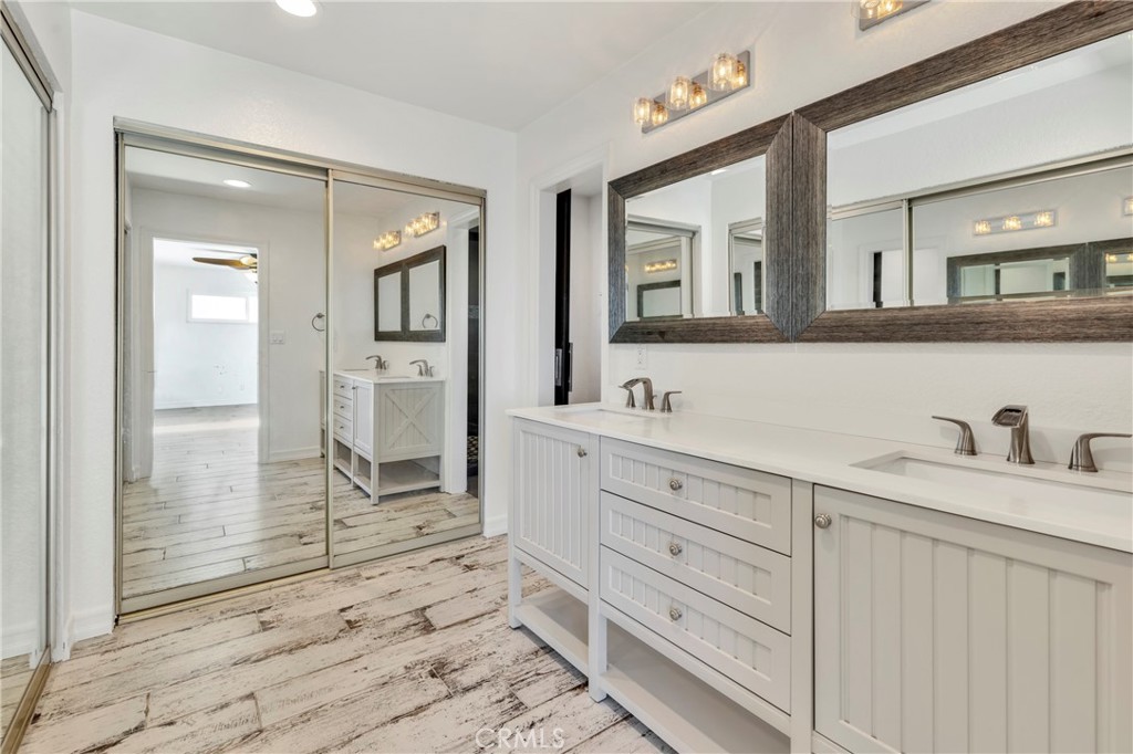 34092 Alcazar Drive, Unit A Dana Point, CA 92629 - Photo 10 of 18 a bathroom with a granite countertop sink mirror and shower