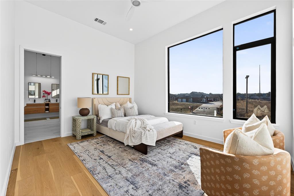 1111 Raiford Road, Unit 105 Carrollton, TX 75007 - Photo 20 of 31 a living room with furniture and a large window