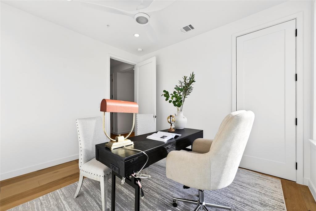 1111 Raiford Road, Unit 105 Carrollton, TX 75007 - Photo 7 of 31 a view of a room with furniture and wooden floor