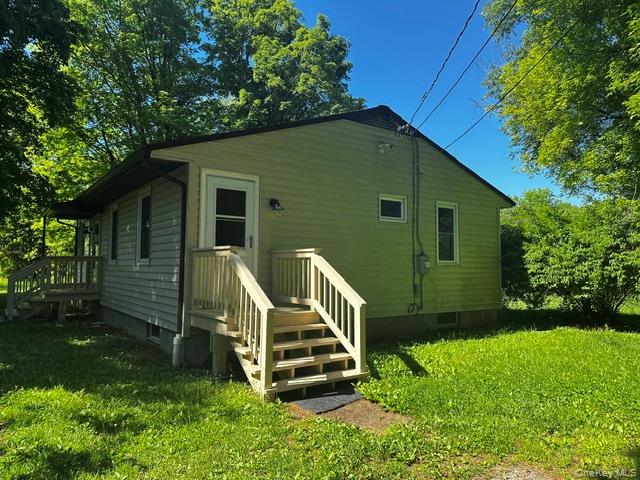 97 Cold Spring Road Stanfordville, NY 12581 - Photo 4 of 16 Single-story residence featuring light colored siding and a dark shingled roof