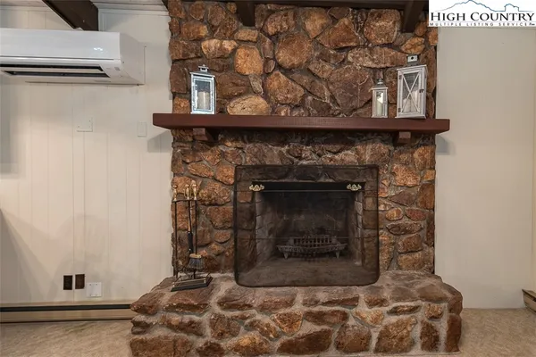 a fireplace with a clock on top of it