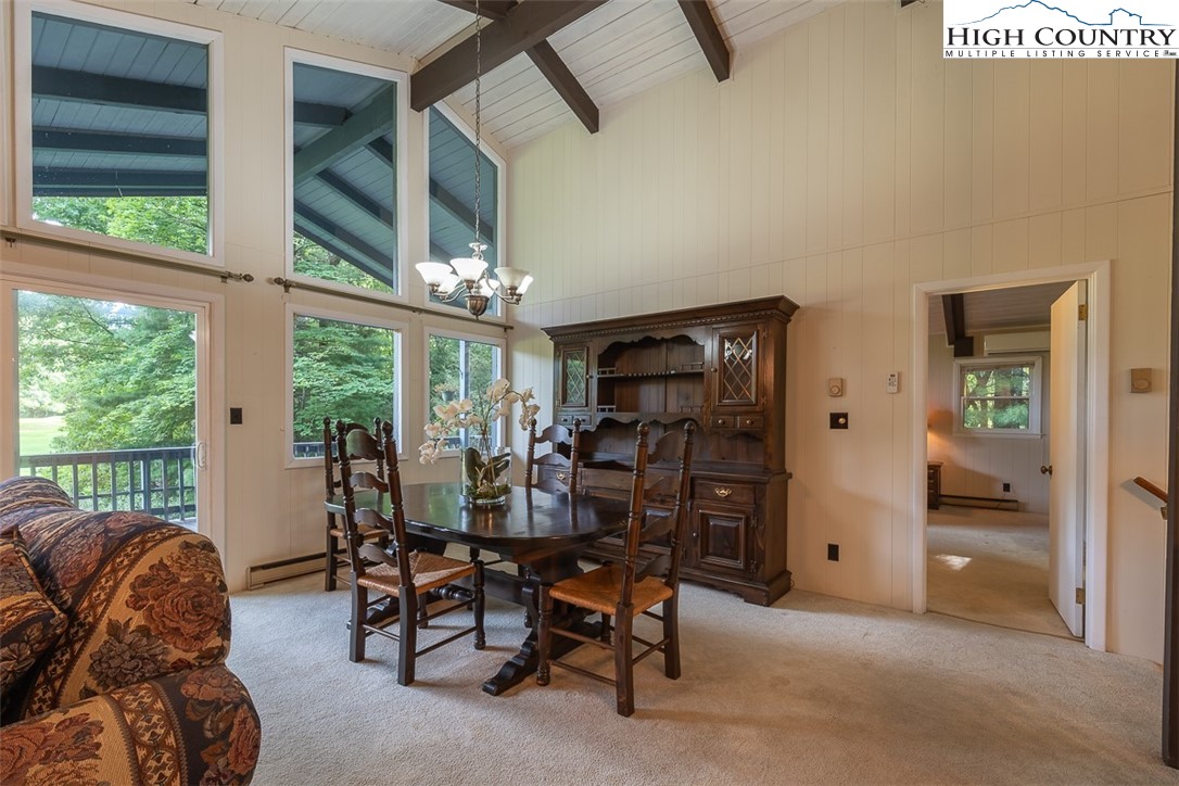 377 Deer Run Road Glade Valley, NC 28627 - Photo 14 of 26 a view of a livingroom with furniture and windows