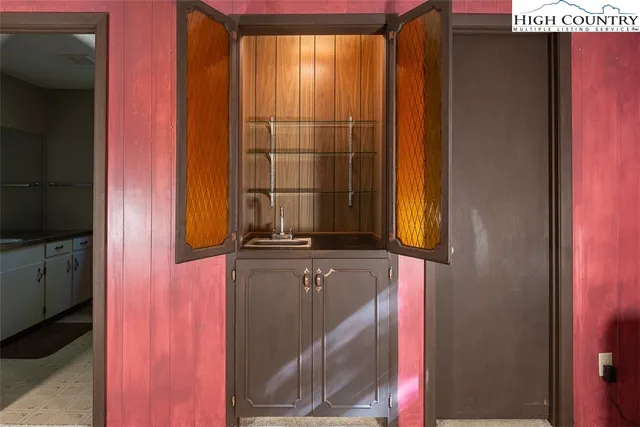 a bathroom with a window and a bath tub