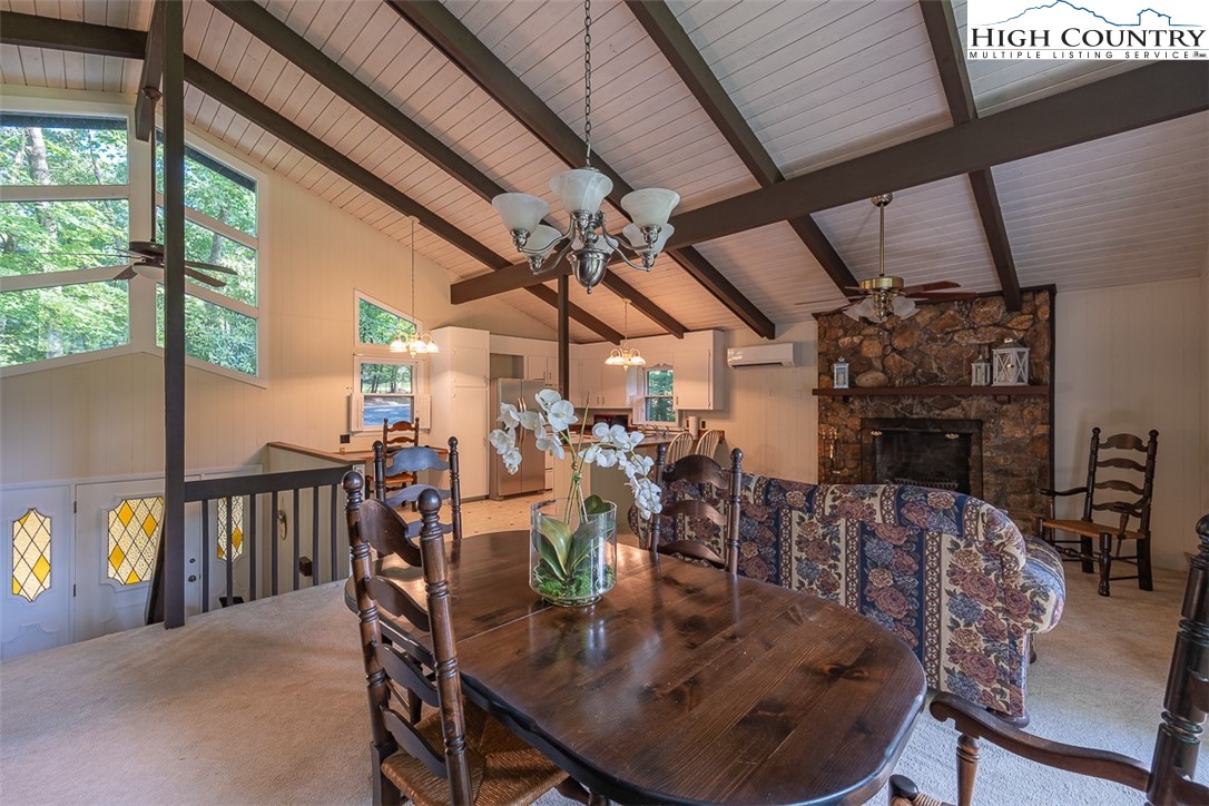 377 Deer Run Road Glade Valley, NC 28627 - Photo 7 of 26 a view of a dining room with furniture window and outside view